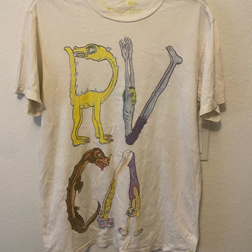 Vintage circa 2008 RVCA tee. Size Medium. Great condition with a unique graphic.